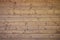 The texture of weathered wooden wall. Aged wooden plank fence of horizontal flat board