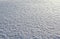 Texture white snow in sunny weather background