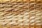 Texture of a wicker basket close up. Natural vine weaving texture. Texture of vine, straw, bamboo, rattan close-up