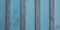 Texture of Wooden blue grey panel Vintage beach wood background vertical weathered plank painted in turquoise gray