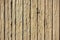 Texture of wooden horizontal old yellow threadbare boards