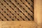 Texture of the wooden lattice. Natural wooden diagonal lattice. Close-up