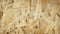 Texture wooden press OSB. Backdrop panning closeup. Abstract interior design