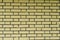 Texture of yellow light brick wall, seamless texture