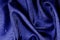 Textured, background, drawing, blue silk fabric. The medium-density silk cloth to be recycled has a creped side and a satin side.