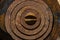 Textured background of rusty rings of iron burner of an old wood stove