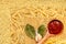 Textured background of various pasta, spices and ketchup in a spoon