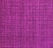 Textured background of violet fabric