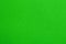 Textured bright green background. Chroma key compositing