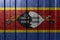 Textured flag of Eswatini on metal wall. Colorful natural abstract geometric background with lines