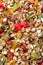 Textured food background. Baked granola with oat flakes, honey, nuts, dried fruit and seeds