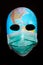 Textured mask with map  wearing surgical mask. Concept for corona virus pandemia