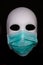 Textured mask with map  wearing surgical mask. Concept for corona virus pandemia