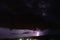 Textured night sky with bright lightning. Global warming