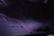 Textured night sky with bright lightning. Global warming
