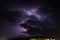 Textured night sky with bright lightning. Global warming