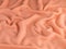 Textured peach color fabric, color of the year 2024 Peach Fuzz