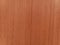 textured plywood wall  brown streaks  Beautiful red for the background.