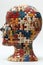 Textured puzzle sculpture of a head with various colored pieces.