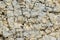 Textured stone background Rubble ballast in natural form in the rock wall