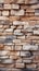 Textured stone wall brick with a seamless pattern of sandstone facade