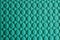 Textured turquoise fabric as background, closeup