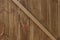 Textured wooden paling fence with cross strut background