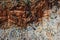 Textures of rocky sandstone cliffs at daytime, white and red rocks. Seitan Limania, Akrotiri peninsula, Chania region