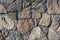 Textures stone background old wall of pieces of granite