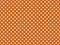 texturised white color polka dots over chocolate brown backgroun