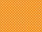 texturised white color polka dots over dark orange background