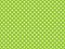 texturised white color polka dots over yellow green background