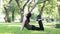 Thai adult beautiful girl doing yoga exercises in the park