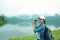 Thai adventure girl happy and holding binoculars