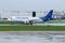 Thai Air Asia Airbus A320, registration HS-ABT, King Power livery, takes off from a wet runway of Donmueang International Airport