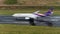 Thai airway depart at Phuket Airport in rainny day