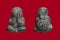 Thai Amulet isolate on a red background. See No Evil Buddha.