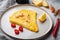 Thai  Asian omelette, fresh red chilli, brown and white crabmeat, lemon, Cheddar cheese, eggs, on plate, on gray background