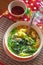 Thai asian spicy soup with chicken ginger grass