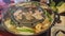 Thai barbecue Grill Pork on hot pan buffet, Moo-gata Pork pan It\\\'s traditional Thai style BBQ