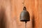 Thai bell on orange wall