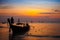 Thai boat silhouette at sunset