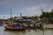 Thai boats in a paradise beach setting