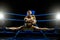 Thai boxer on boxing ring do the splits