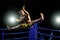 Thai boxer on boxing ring, jump and kicking