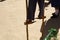 Thai boy walking on homemade bamboo stilts