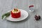 Thai Cake. Velvet red cake. Cookies decorated with red cake on wooden table and flower. strawberries moring. Cherry in the cup.