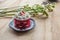 Thai Cake. Velvet red cake. Cookies and Strawberry decorated with red cake on wooden table and flower