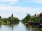 Thai canal life style with wooden floating boat and trees