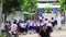 Thai children in school uniform leave school Koh Samui Thailand